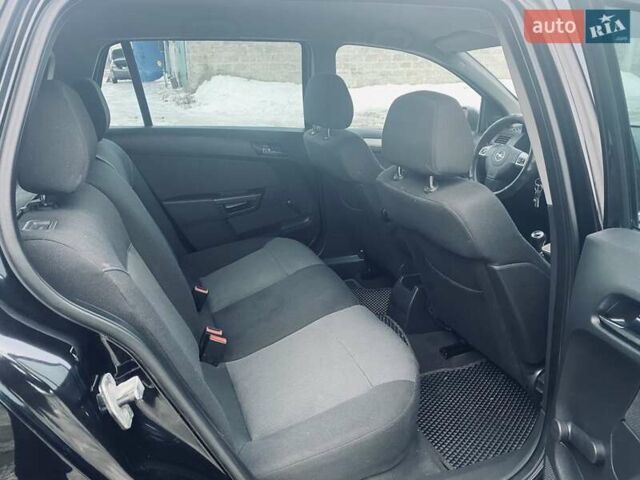 Черный Опель Астра, объемом двигателя 1.6 л и пробегом 213 тыс. км за 5500 $, фото 10 на Automoto.ua