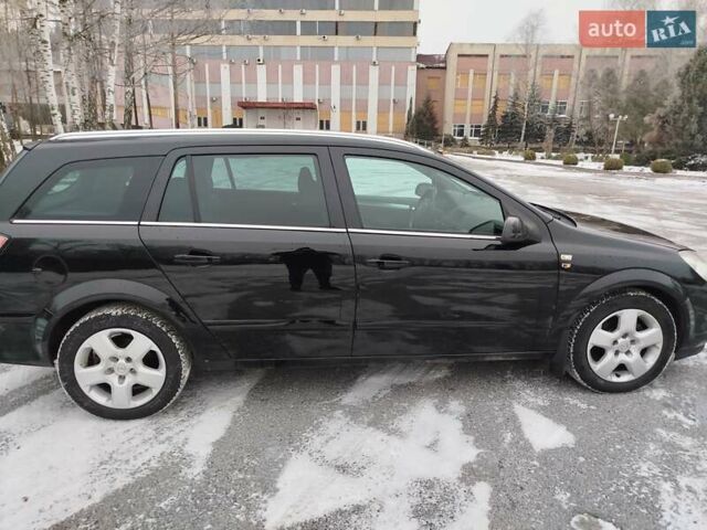 Черный Опель Астра, объемом двигателя 1.6 л и пробегом 255 тыс. км за 5650 $, фото 9 на Automoto.ua