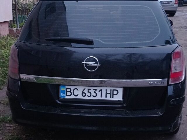 Черный Опель Астра, объемом двигателя 1.9 л и пробегом 240 тыс. км за 3700 $, фото 2 на Automoto.ua