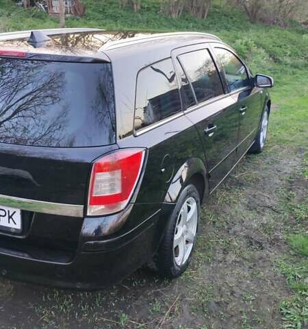 Черный Опель Астра, объемом двигателя 1.6 л и пробегом 235 тыс. км за 5800 $, фото 17 на Automoto.ua