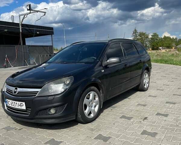 Черный Опель Астра, объемом двигателя 1.91 л и пробегом 242 тыс. км за 4500 $, фото 4 на Automoto.ua