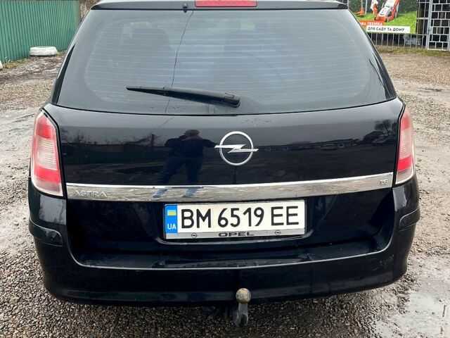 Черный Опель Астра, объемом двигателя 1.6 л и пробегом 245 тыс. км за 5400 $, фото 2 на Automoto.ua