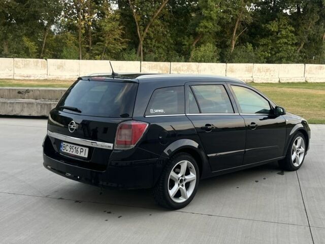 Черный Опель Астра, объемом двигателя 1.9 л и пробегом 270 тыс. км за 5200 $, фото 3 на Automoto.ua