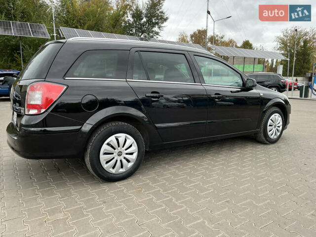Черный Опель Астра, объемом двигателя 1.6 л и пробегом 223 тыс. км за 5750 $, фото 16 на Automoto.ua