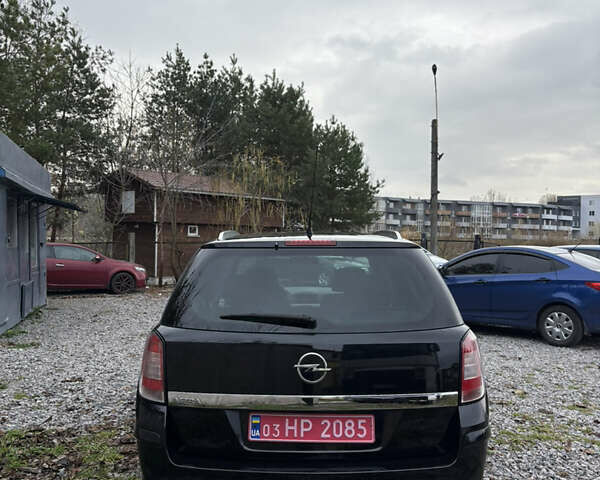 Черный Опель Астра, объемом двигателя 1.6 л и пробегом 208 тыс. км за 5600 $, фото 11 на Automoto.ua
