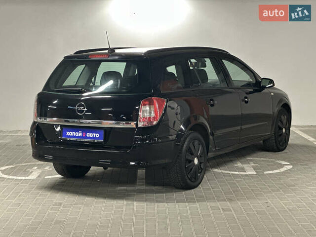 Черный Опель Астра, объемом двигателя 1.6 л и пробегом 216 тыс. км за 5600 $, фото 1 на Automoto.ua