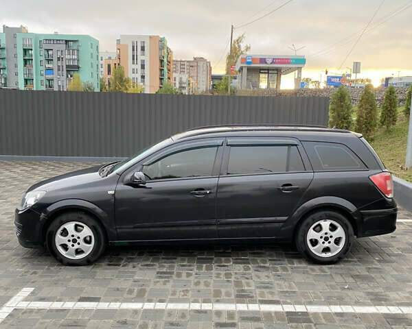 Чорний Опель Астра, об'ємом двигуна 1.25 л та пробігом 202 тис. км за 4500 $, фото 3 на Automoto.ua