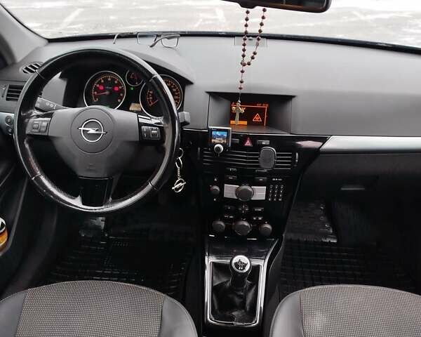 Черный Опель Астра, объемом двигателя 1.6 л и пробегом 255 тыс. км за 5650 $, фото 33 на Automoto.ua