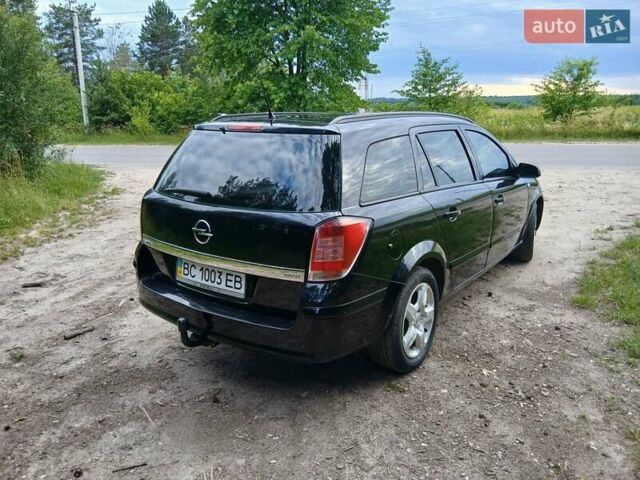 Черный Опель Астра, объемом двигателя 1.3 л и пробегом 296 тыс. км за 4350 $, фото 1 на Automoto.ua