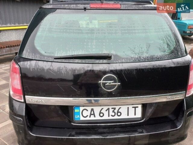 Черный Опель Астра, объемом двигателя 1.6 л и пробегом 257 тыс. км за 4700 $, фото 5 на Automoto.ua