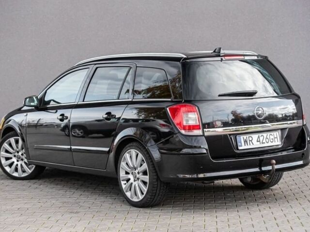 Черный Опель Астра, объемом двигателя 1.9 л и пробегом 300 тыс. км за 2650 $, фото 4 на Automoto.ua