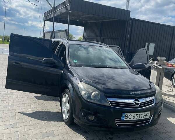 Черный Опель Астра, объемом двигателя 1.91 л и пробегом 242 тыс. км за 4500 $, фото 1 на Automoto.ua