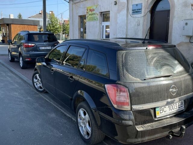 Черный Опель Астра, объемом двигателя 1.2 л и пробегом 296 тыс. км за 4350 $, фото 2 на Automoto.ua