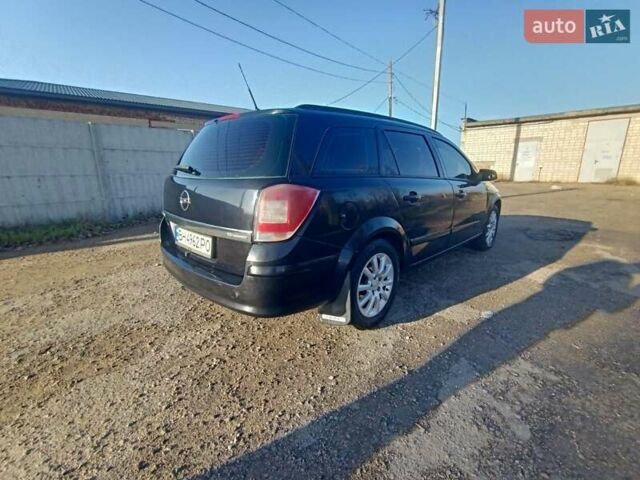 Черный Опель Астра, объемом двигателя 1.6 л и пробегом 290 тыс. км за 6200 $, фото 1 на Automoto.ua