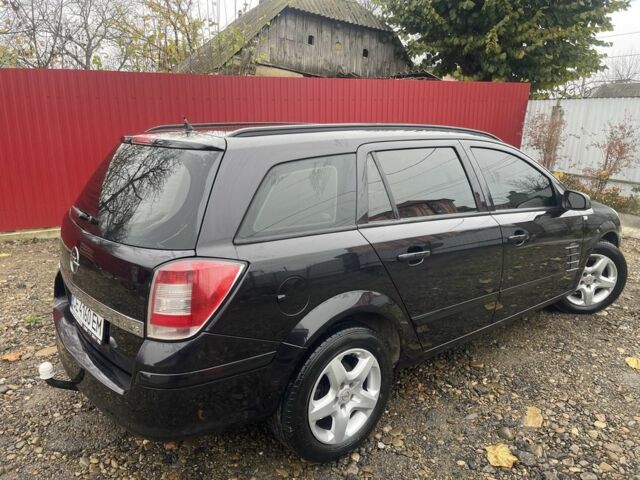 Черный Опель Астра, объемом двигателя 1.6 л и пробегом 245 тыс. км за 5300 $, фото 4 на Automoto.ua