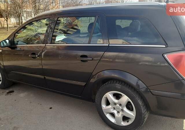 Чорний Опель Астра, об'ємом двигуна 1.6 л та пробігом 207 тис. км за 5400 $, фото 2 на Automoto.ua