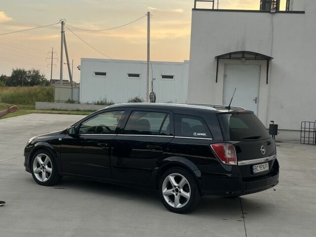 Черный Опель Астра, объемом двигателя 1.9 л и пробегом 270 тыс. км за 5200 $, фото 2 на Automoto.ua