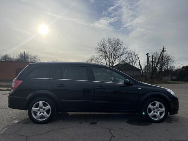 Черный Опель Астра, объемом двигателя 1.6 л и пробегом 239 тыс. км за 5350 $, фото 5 на Automoto.ua