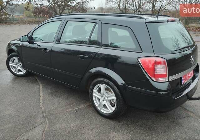 Черный Опель Астра, объемом двигателя 1.82 л и пробегом 204 тыс. км за 5950 $, фото 6 на Automoto.ua