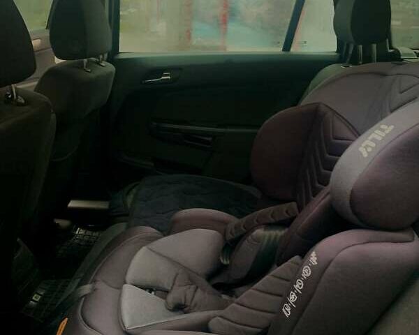 Черный Опель Астра, объемом двигателя 1.6 л и пробегом 221 тыс. км за 4800 $, фото 13 на Automoto.ua