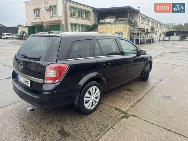 Черный Опель Астра, объемом двигателя 1.69 л и пробегом 300 тыс. км за 4500 $, фото 12 на Automoto.ua