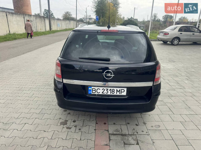 Черный Опель Астра, объемом двигателя 1.69 л и пробегом 351 тыс. км за 4600 $, фото 14 на Automoto.ua