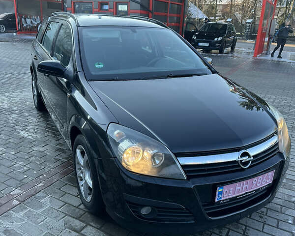 Черный Опель Астра, объемом двигателя 1.6 л и пробегом 228 тыс. км за 4400 $, фото 5 на Automoto.ua