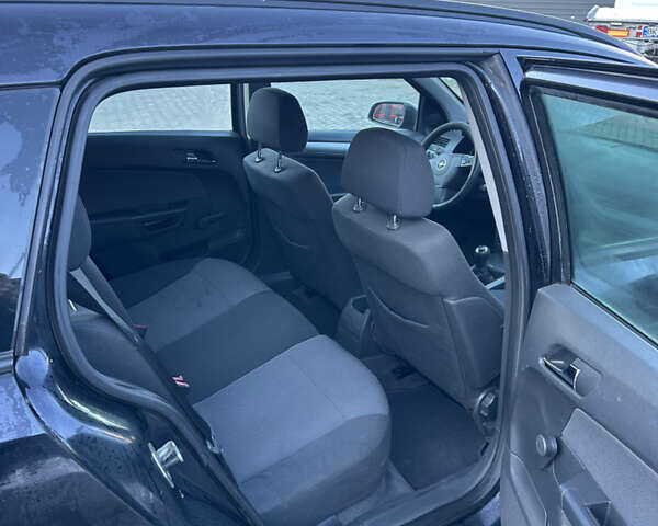 Черный Опель Астра, объемом двигателя 1.6 л и пробегом 228 тыс. км за 4400 $, фото 11 на Automoto.ua