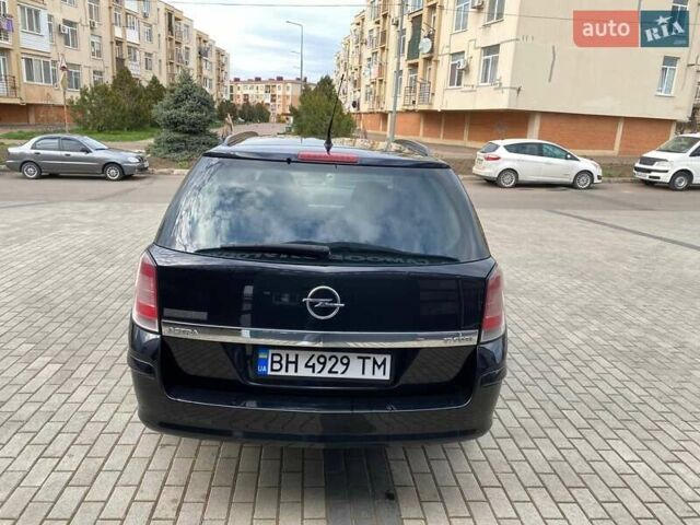 Черный Опель Астра, объемом двигателя 1.7 л и пробегом 312 тыс. км за 5000 $, фото 1 на Automoto.ua