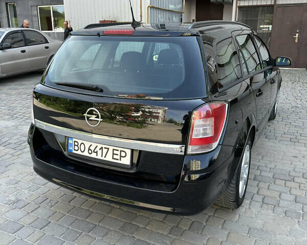 Черный Опель Астра, объемом двигателя 1.6 л и пробегом 188 тыс. км за 5650 $, фото 8 на Automoto.ua