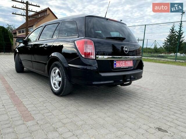 Черный Опель Астра, объемом двигателя 1.6 л и пробегом 222 тыс. км за 5200 $, фото 13 на Automoto.ua