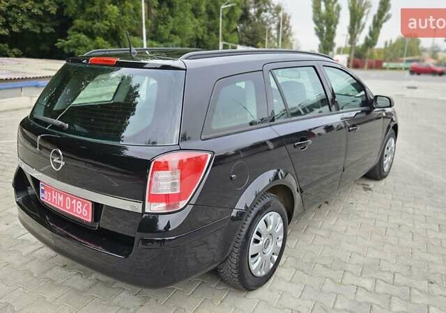 Черный Опель Астра, объемом двигателя 1.6 л и пробегом 209 тыс. км за 5850 $, фото 25 на Automoto.ua