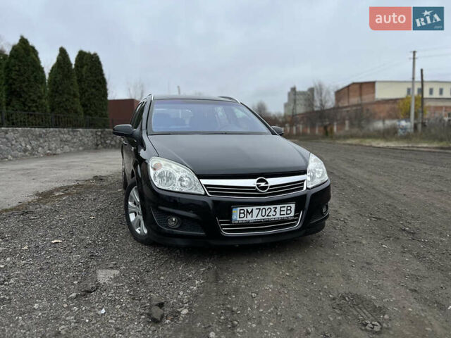 Черный Опель Астра, объемом двигателя 1.8 л и пробегом 209 тыс. км за 5600 $, фото 11 на Automoto.ua