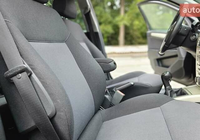 Черный Опель Астра, объемом двигателя 1.6 л и пробегом 209 тыс. км за 5850 $, фото 53 на Automoto.ua