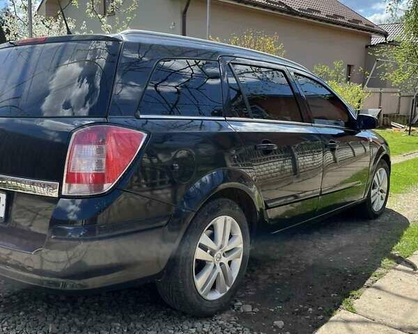 Черный Опель Астра, объемом двигателя 1.6 л и пробегом 218 тыс. км за 5000 $, фото 5 на Automoto.ua
