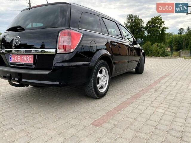 Черный Опель Астра, объемом двигателя 1.6 л и пробегом 222 тыс. км за 5200 $, фото 11 на Automoto.ua