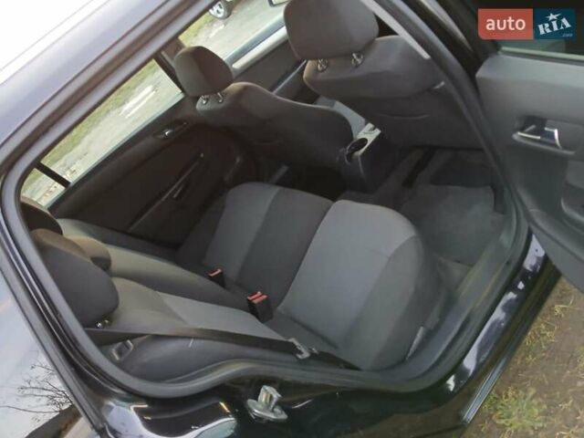 Черный Опель Астра, объемом двигателя 1.8 л и пробегом 177 тыс. км за 5199 $, фото 13 на Automoto.ua