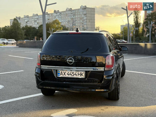 Черный Опель Астра, объемом двигателя 1.6 л и пробегом 194 тыс. км за 6499 $, фото 4 на Automoto.ua