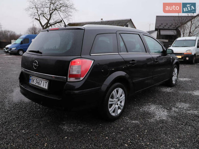 Черный Опель Астра, объемом двигателя 1.69 л и пробегом 308 тыс. км за 5500 $, фото 4 на Automoto.ua