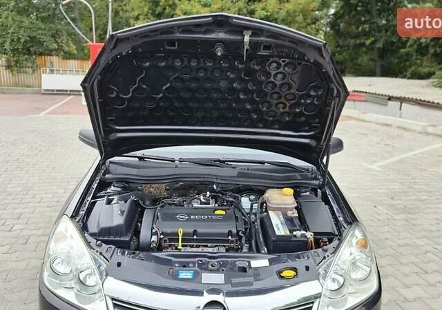 Черный Опель Астра, объемом двигателя 1.6 л и пробегом 209 тыс. км за 5850 $, фото 37 на Automoto.ua