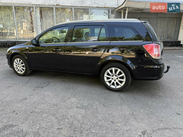 Черный Опель Астра, объемом двигателя 1.6 л и пробегом 219 тыс. км за 6000 $, фото 7 на Automoto.ua