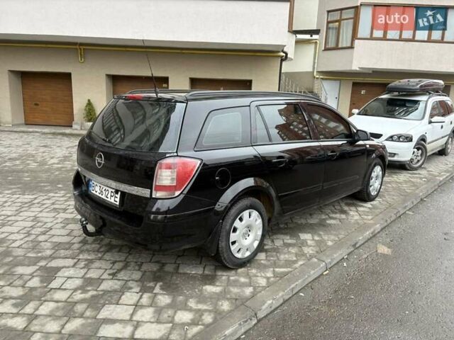 Черный Опель Астра, объемом двигателя 1.7 л и пробегом 276 тыс. км за 5200 $, фото 2 на Automoto.ua