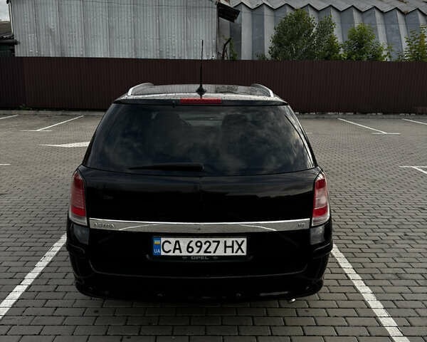 Черный Опель Астра, объемом двигателя 1.8 л и пробегом 405 тыс. км за 5500 $, фото 7 на Automoto.ua