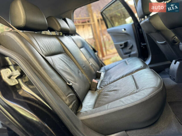 Черный Опель Астра, объемом двигателя 1.6 л и пробегом 180 тыс. км за 5499 $, фото 165 на Automoto.ua