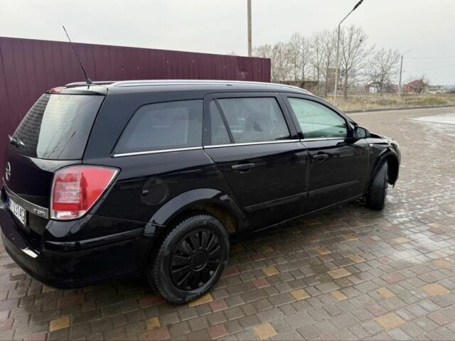 Черный Опель Астра, объемом двигателя 1.7 л и пробегом 240 тыс. км за 2800 $, фото 6 на Automoto.ua