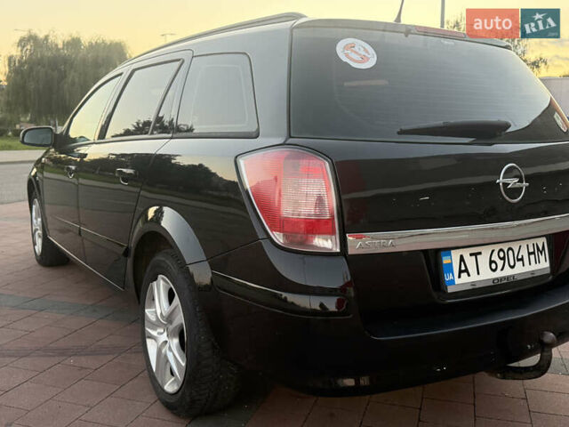 Черный Опель Астра, объемом двигателя 1.69 л и пробегом 260 тыс. км за 5550 $, фото 14 на Automoto.ua