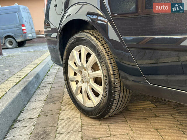 Черный Опель Астра, объемом двигателя 1.6 л и пробегом 180 тыс. км за 5499 $, фото 79 на Automoto.ua