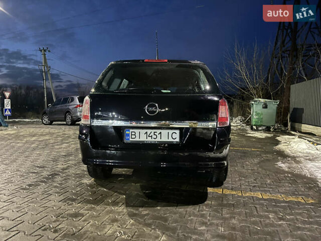 Черный Опель Астра, объемом двигателя 1.69 л и пробегом 270 тыс. км за 5500 $, фото 22 на Automoto.ua