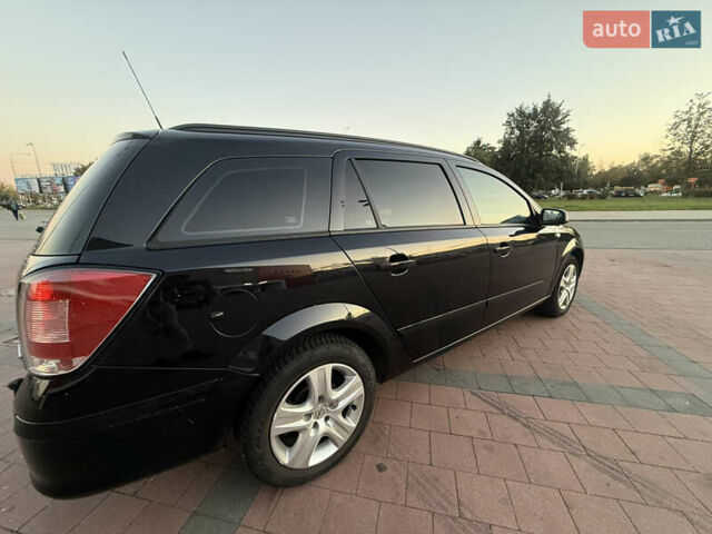 Черный Опель Астра, объемом двигателя 1.69 л и пробегом 260 тыс. км за 5550 $, фото 25 на Automoto.ua