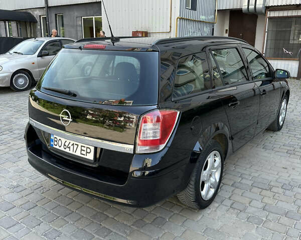 Черный Опель Астра, объемом двигателя 1.6 л и пробегом 188 тыс. км за 5650 $, фото 9 на Automoto.ua